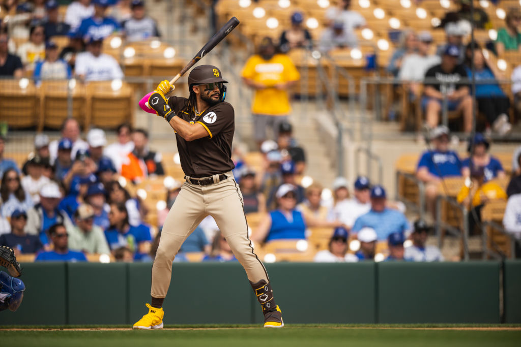 The Padres are wearing the ugliest unis I have ever seen. Camo tops with  yellow gear, a bright white ad patch, and their brown helmets. Is there a  more disgusting uniform out