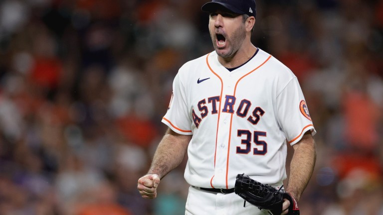 Justin Verlander of the Houston Astros reacts to striking out Pavin Smith #26 of the Arizona Diamondbacks to get out of the seventh inning with two men on base at Minute Maid Park.