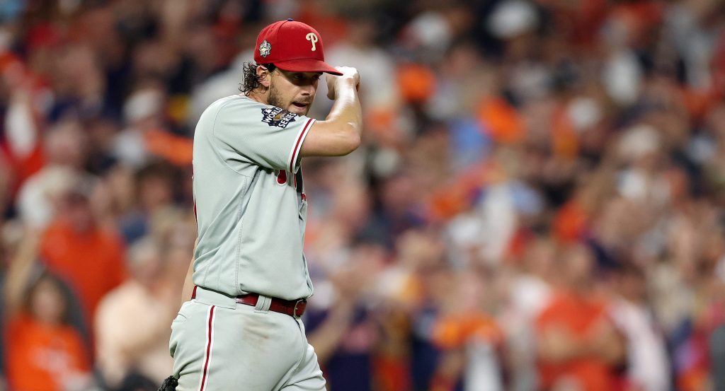 HOUSTON, TEXAS - OCTOBER 28: Aaron Nola #27 of the Philadelphia Phillies reacts after giving up a run in the second inning against the Houston Astros in Game One of the 2022 World Series at Minute Maid Park on October 28, 2022 in Houston, Texas. (Photo by Sean M. Haffey/Getty Images)