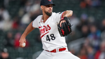 Jorge Lopez of the Minnesota Twins pitches against the New York Yankees.