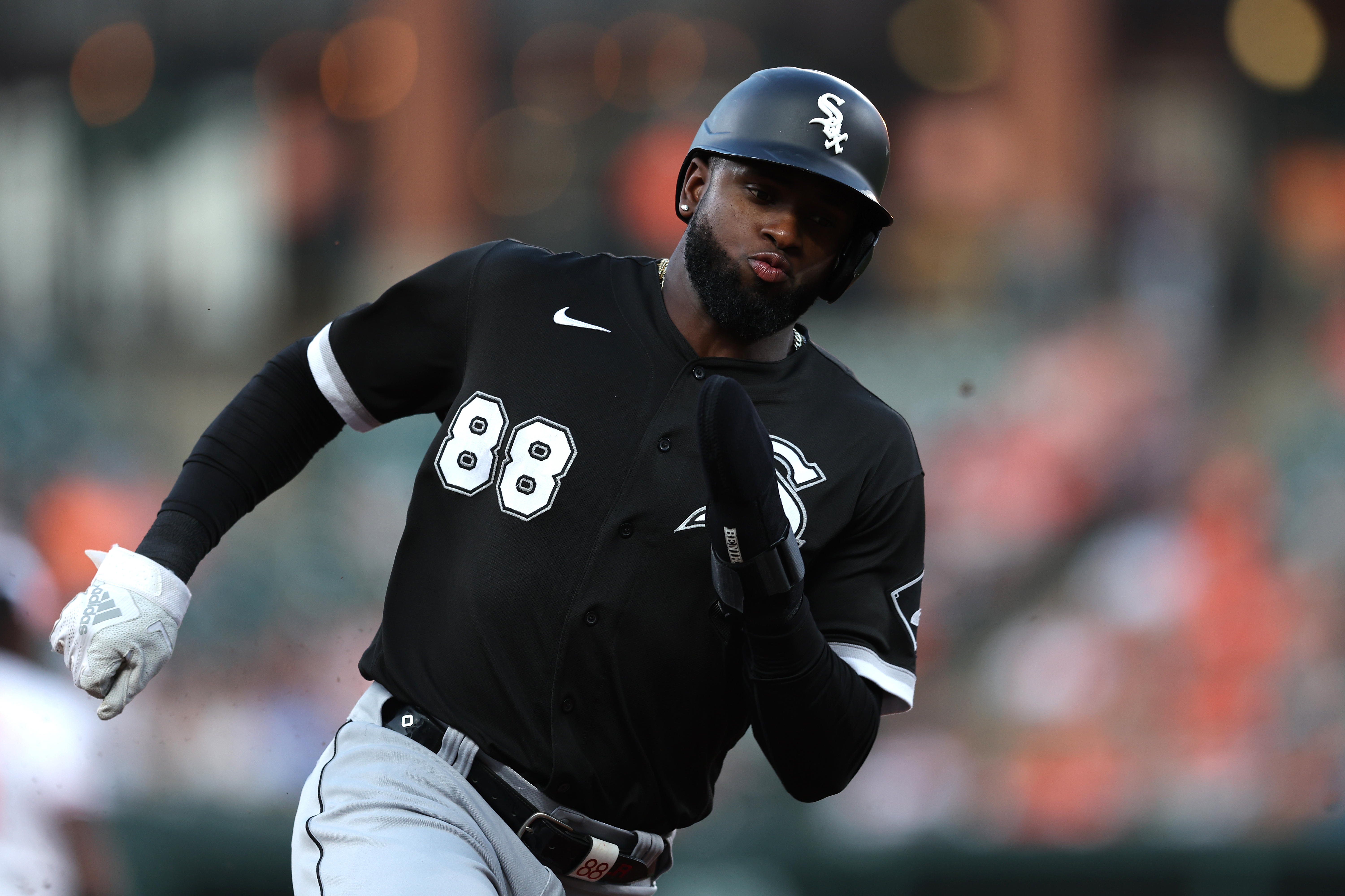 Luis Robert of the Chicago White Sox rounds the bases before scoring a run against the Baltimore Orioles during the first inning at Oriole Park at Camden Yards.