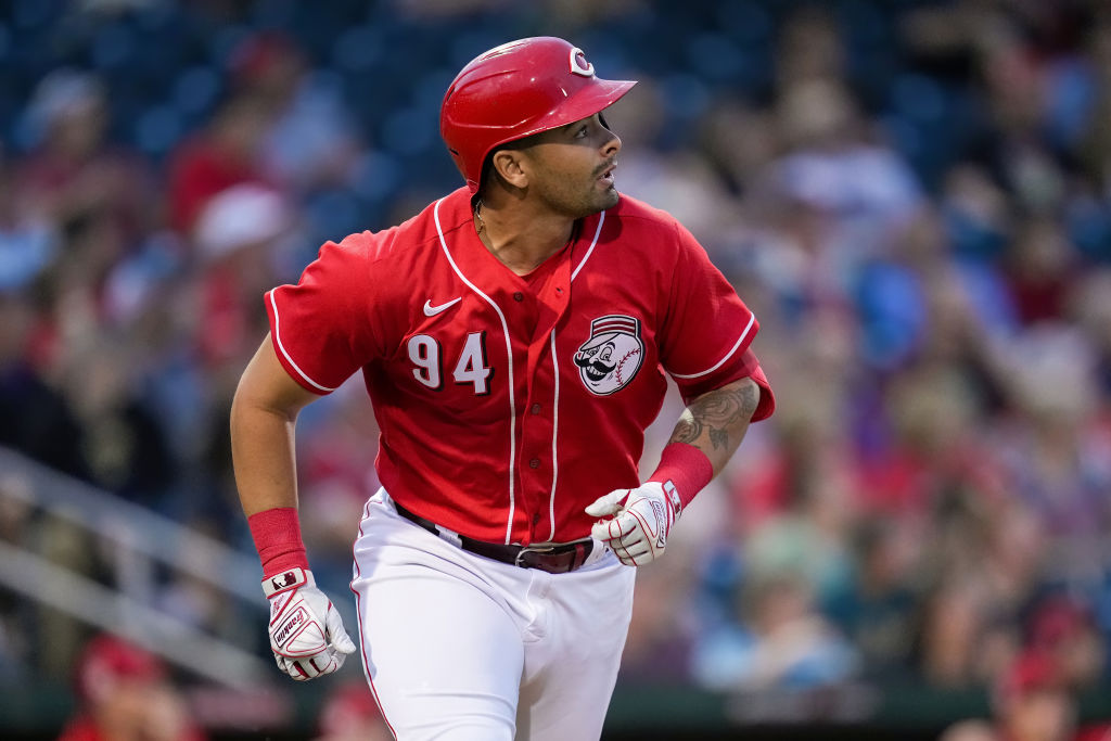 GOODYEAR, ARIZONA - MARCH 10: Christian Encarnacion-Strand #94 of the Cincinnati Reds hits a home run in the first inning against the Arizona Diamondbacks during a spring training game at Goodyear Ballpark on March 10, 2023 in Goodyear, Arizona. (Photo by Dylan Buell/Getty Images)
