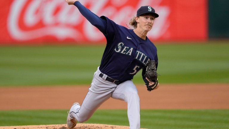 Bryce Miller of the Seattle Mariners making his major league debut pitches against the Oakland Athletics in the bottom of the first inning at RingCentral Coliseum.