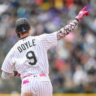 Brenton Doyle of the Colorado Rockies celebrates as he rounds the bases after hitting a fifth inning solo homerun in a game against the Philadelphia Phillies at Coors Field.