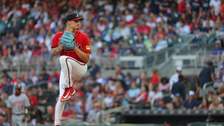 AJ Smith-Shawver of the Atlanta Braves pitches in the second inning against the Washington Nationals at Truist Park.