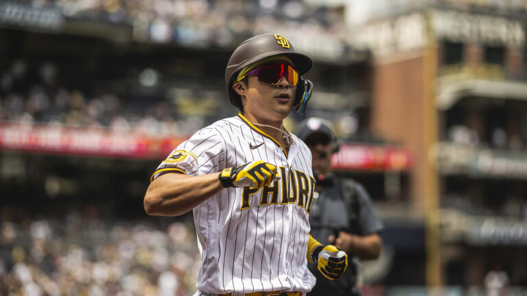 Ha-Seong Kim of the San Diego Padres celebrates after hitting a home run in the first inning during game one of a doubleheader game against the Arizona Diamondbacks at Petco Park.