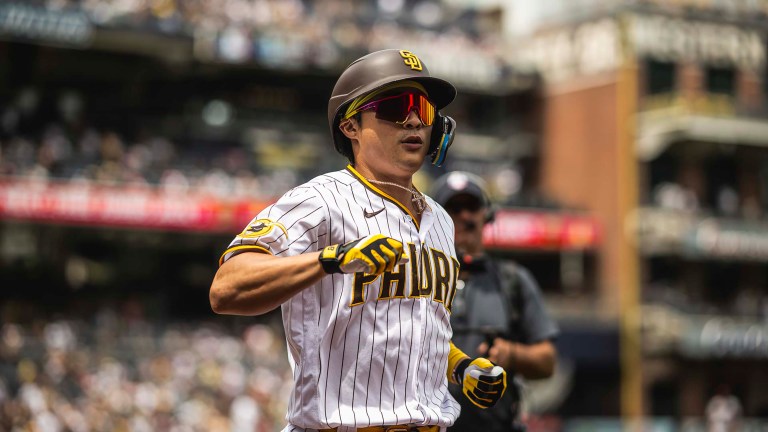 Ha-Seong Kim of the San Diego Padres celebrates after hitting a home run in the first inning during game one of a doubleheader game against the Arizona Diamondbacks at Petco Park.