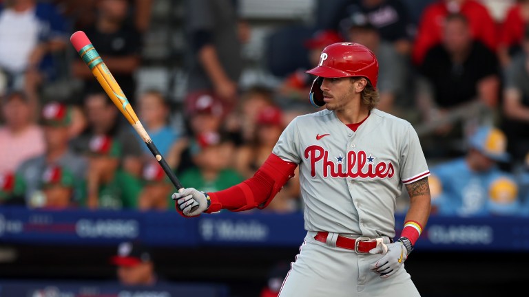 Bryson Stott of the Philadelphia Phillies bats with a pencil designed bat against the Washington Nationals in the first inning during the 2023 Little League Classic at Bowman Field.