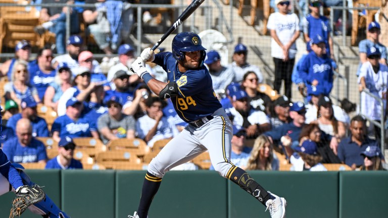 Jackson Chourio of the Milwaukee Brewers bats during the ninth inning of a spring training game against the Los Angeles Dodgers at Camelback Ranch.