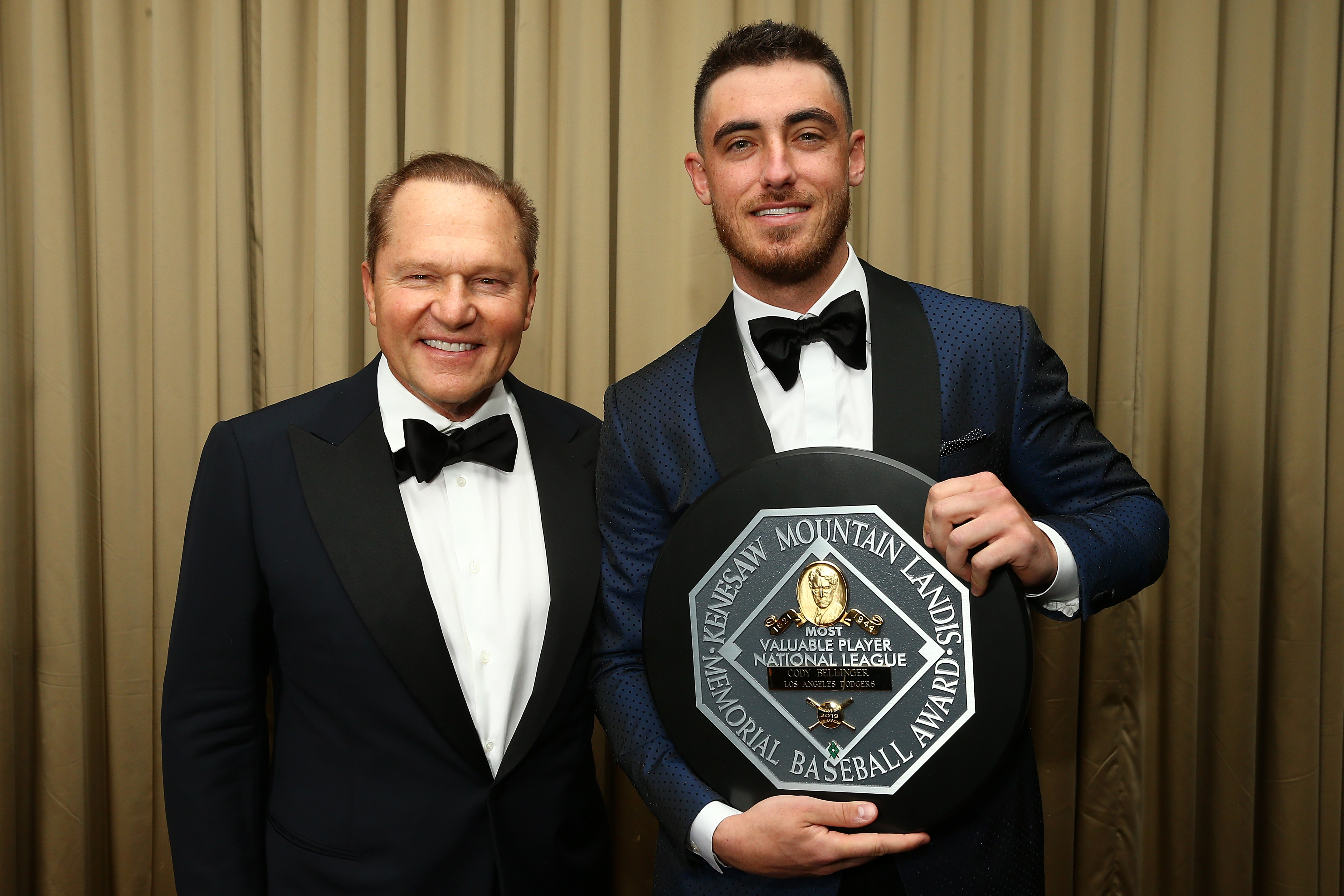 National League MVP Cody Bellinger of the Los Angeles Dodgers and Sports Agent Scott Boras poses for a photo during the  97th annual New York Baseball Writers' Dinner.
