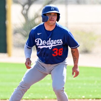 Dalton Rushing of the Los Angeles Dodgers takes a lead at first base during a minor league spring training game against the Cleveland Guardians at Camelback Ranch.