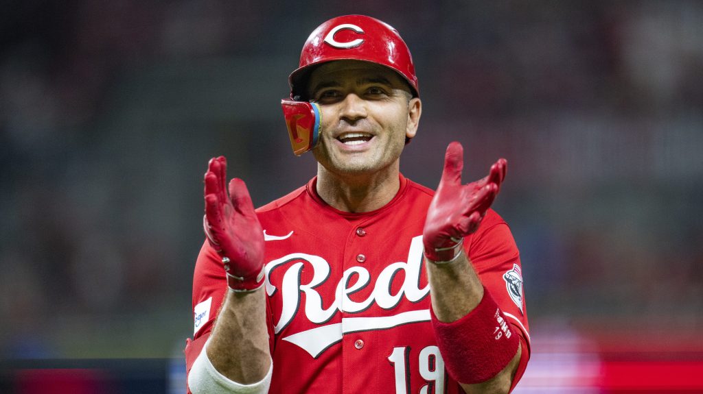 CINCINNATI, OHIO - AUGUST 19: Joey Votto #19 of the Cincinnati Reds smiles and claps during a game against the Toronto Blue Jays at Great American Ball Park on August 19, 2023 in Cincinnati, Ohio. (Photo by Emilee Chinn/Cincinnati Reds/Getty Images)