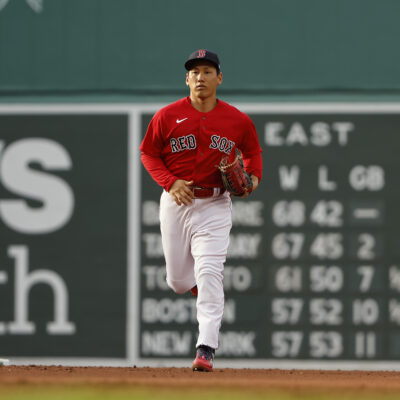 Masataka Yoshida of the Boston Red Sox runs in from left field against the Toronto Blue Jays during the ninth inning at Fenway Park.