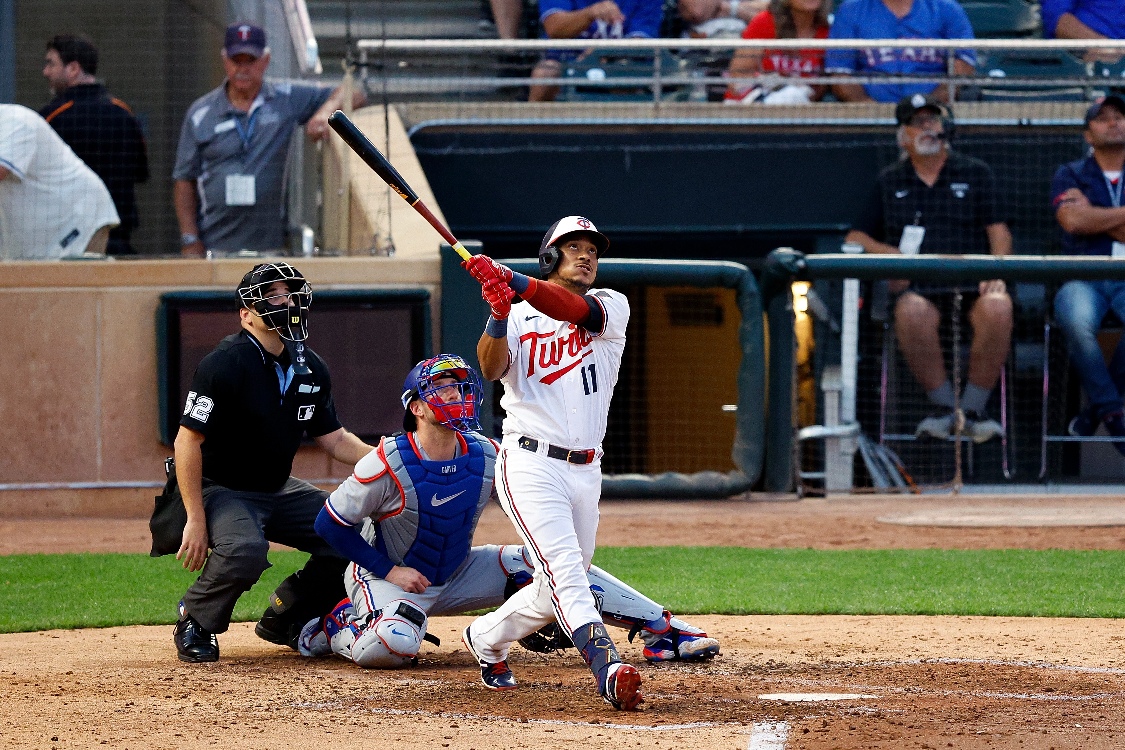 Jorge Polanco of the Minnesota Twins hits a solo home run against the Texas Rangers in the sixth inning at Target Field.