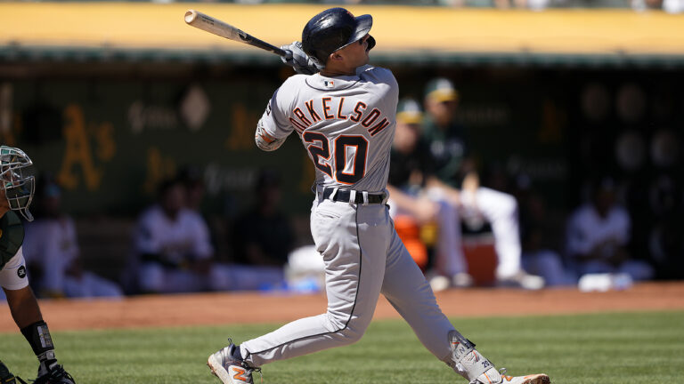 Spencer Torkelson #20 of the Detroit Tigers hits a two run rbi single against the Oakland Athletics in the top of the third inning at RingCentral Coliseum.