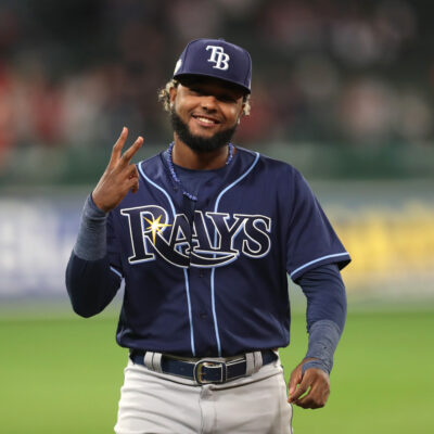 Junior Caminero of the Tampa Bay Rays warms up before playing against the Boston Red Sox at Fenway Park.