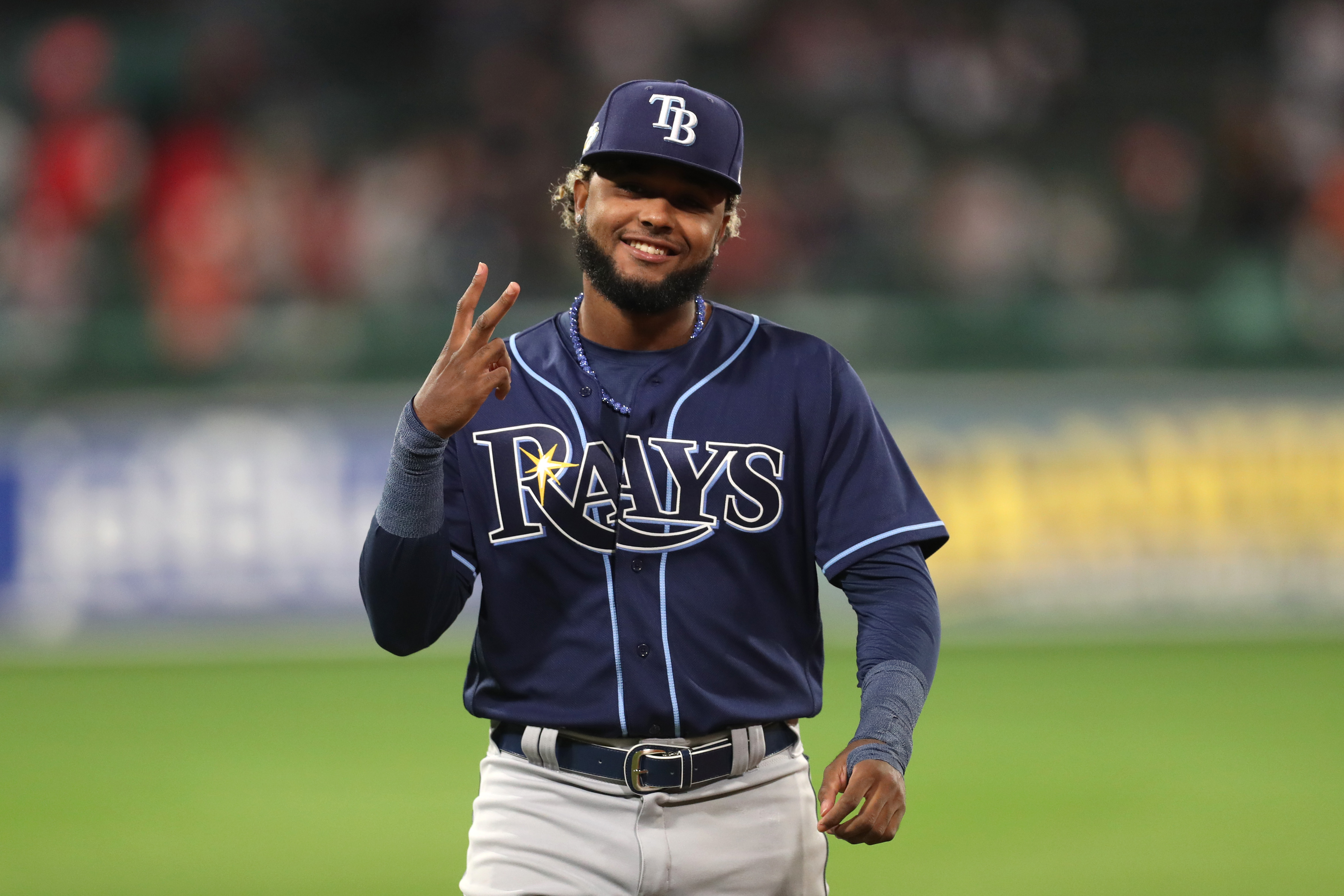 Junior Caminero of the Tampa Bay Rays warms up before playing against the Boston Red Sox at Fenway Park.