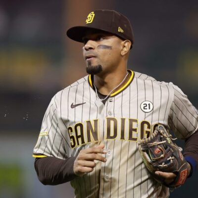 Xander Bogaerts of the San Diego Padres looks on between innings against the Oakland Athletics at RingCentral Coliseum.