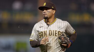 Xander Bogaerts of the San Diego Padres looks on between innings against the Oakland Athletics at RingCentral Coliseum.