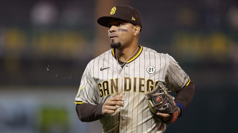 Xander Bogaerts of the San Diego Padres looks on between innings against the Oakland Athletics at RingCentral Coliseum.