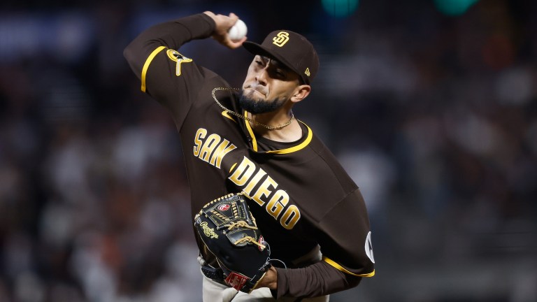 Robert Suarez of the San Diego Padres pitches against the San Francisco Giants at Oracle Park.