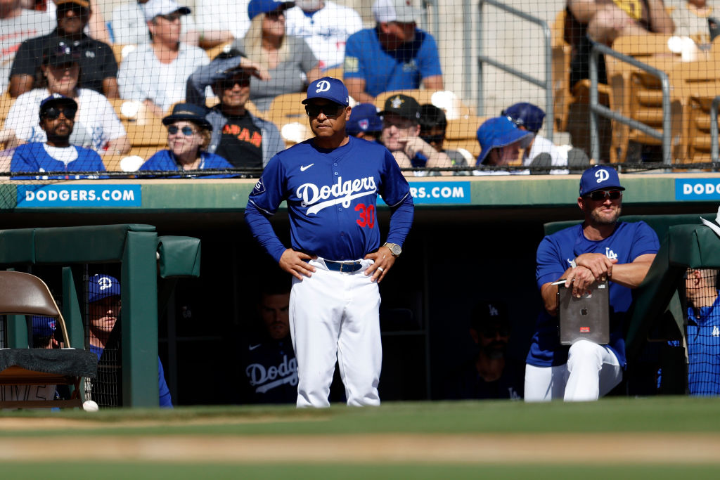 GLENDALE, ARIZONA - FEBRUARY 23: Manager Dave Roberts #30 of the Los Angeles Dodgers watches the action during a spring training game at Camelback Ranch on February 23, 2024 in Glendale, Arizona. (Photo by Chris Coduto/Getty Images)