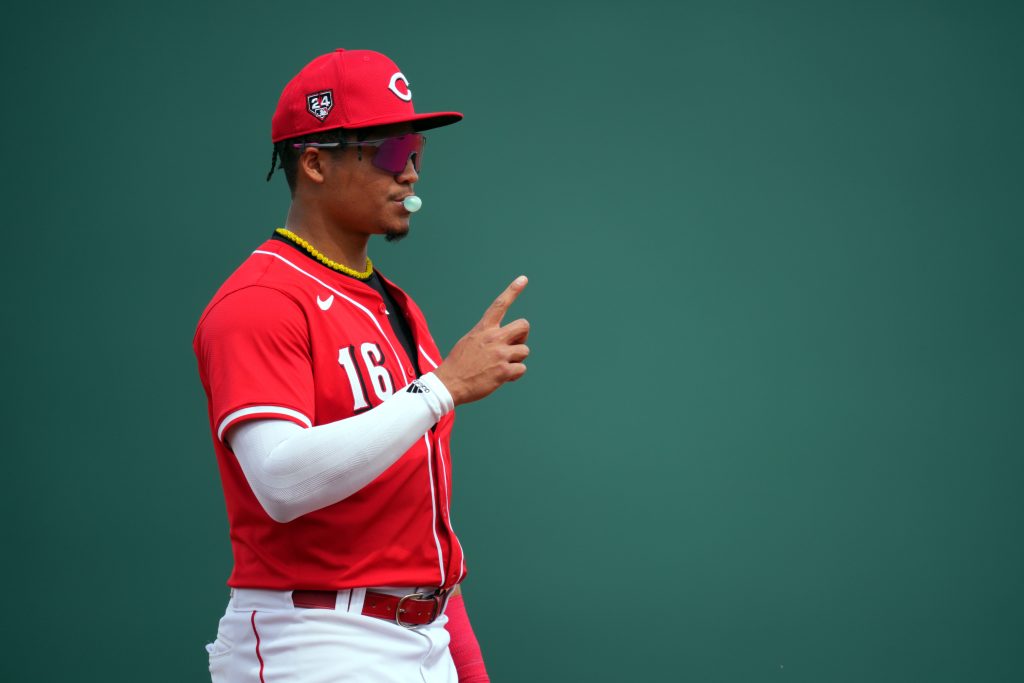 GOODYEAR, ARIZONA - MARCH 06: Noelvi Marte #16 of the Cincinnati Reds signals to teammates between batters in the second inning during a spring training game against the Milwaukee Brewers at Goodyear Ballpark on March 06, 2024 in Goodyear, Arizona. (Photo by Aaron Doster/Getty Images)