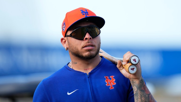 Francisco Alvarez of the New York Mets looks on prior to a spring training game between the Miami Marlins and the New York Mets at Roger Dean Stadium.