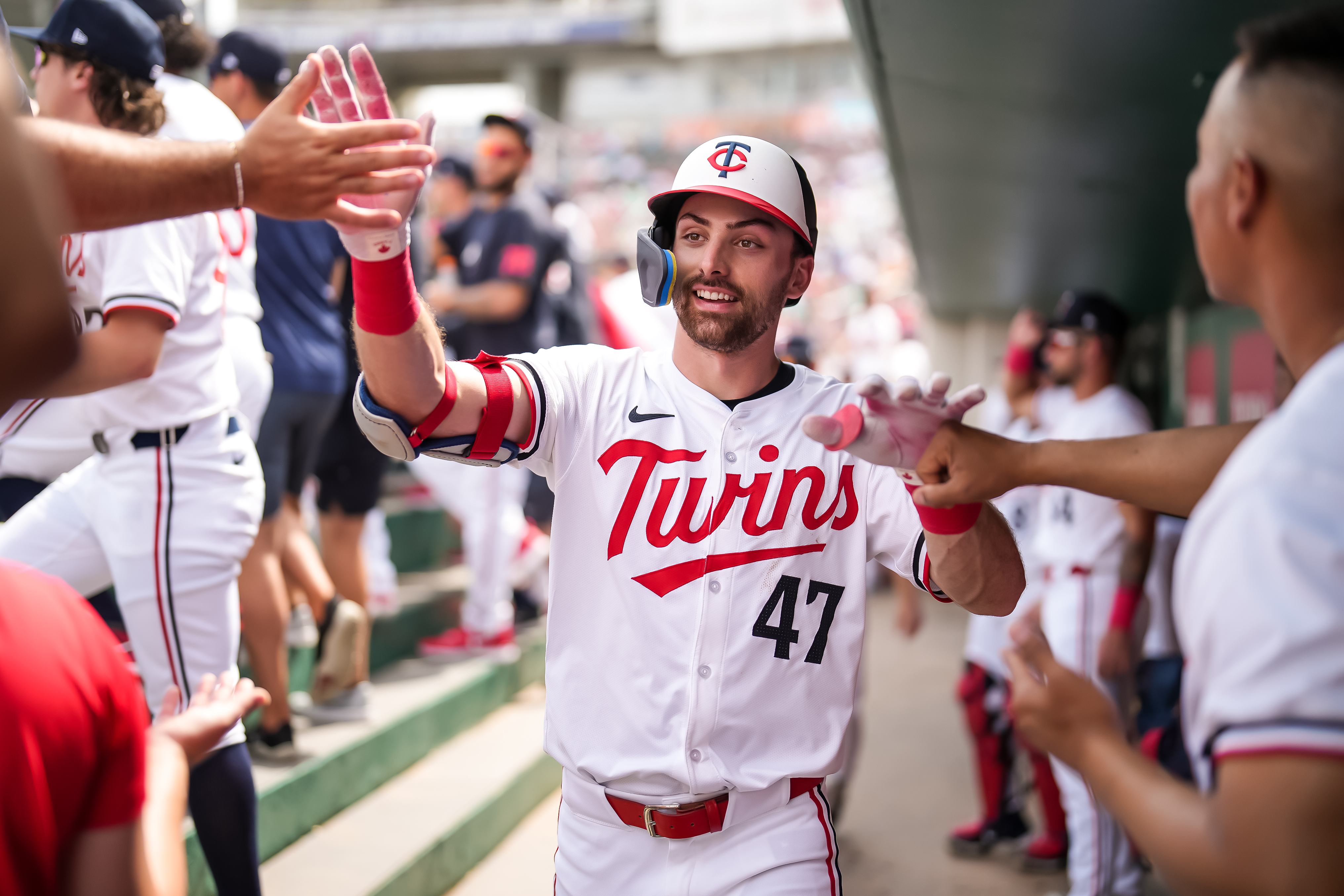 Edouard Julien of the Minnesota Twins celebrates during a spring training game against the Boston Red Sox at the Lee County Sports Complex.