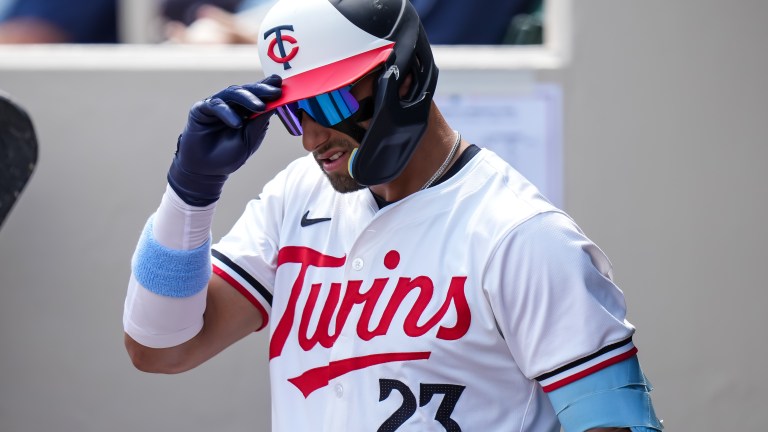Royce Lewis of the Minnesota Twins looks on during a spring training game against the St. Louis Cardinals on March 13, 2024 at the Lee County Sports Complex.