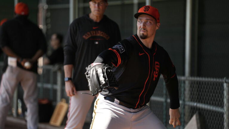 Blake Snell (7) of the San Francisco Giants throws a bullpen session at Scottsdale Stadium.