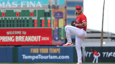 Caden Dana of the Los Angeles Angels warms up prior to the 2024 Spring Breakout Game between the Los Angeles Dodgers and the Los Angeles Angels at Tempe Diablo Stadium.