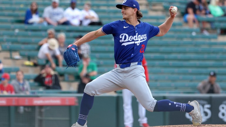 Justin Wrobleski of the Los Angeles Dodgers pitches during the 2024 Spring Breakout Game between the Los Angeles Dodgers and the Los Angeles Angels at Tempe Diablo Stadium.