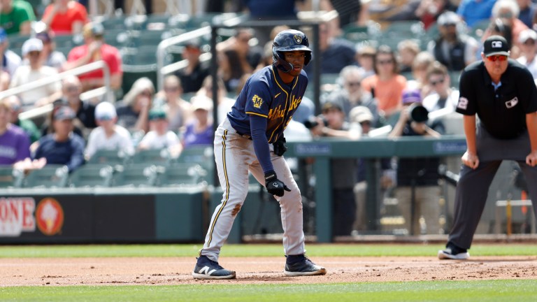 Yophery Rodriguez of the Milwaukee Brewers leads off first base during a spring training game against the Colorado Rockies at Salt River Fields.