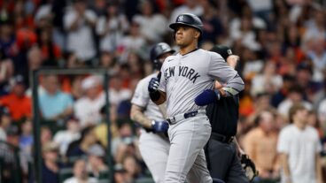 Juan Soto of the New York Yankees scores in the third inning against the Houston Astros at Minute Maid Park.