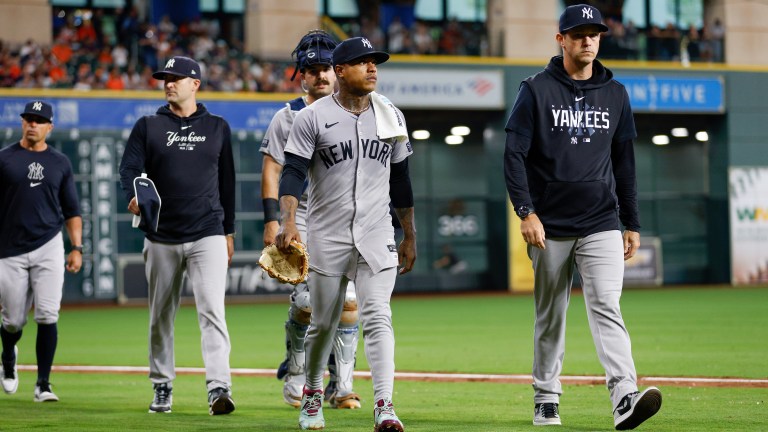 Marcus Stroman of the New York Yankees walks to the dugout before the game against the Houston Astros.