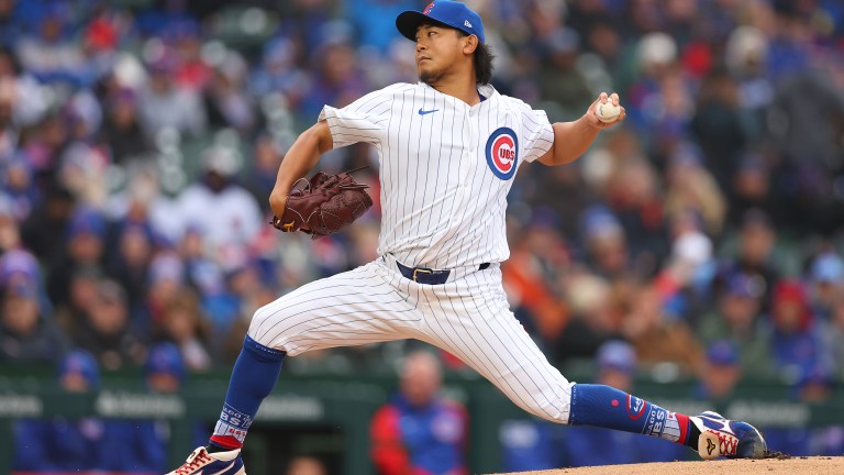 Shota Imanaga of the Chicago Cubs delivers a pitch in his MLB debut against the Colorado Rockies during the first inning at Wrigley Field.