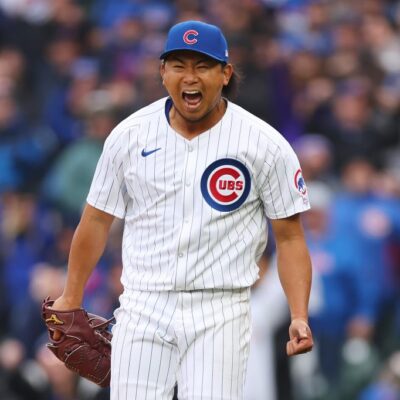 Shota Imanaga #18 of the Chicago Cubs celebrates after retiring the side in the sixth inning against the Colorado Rockies during his MLB debut at Wrigley Field.