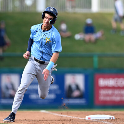 Carson Williams #80 of the Tampa Bay Rays rounds third base to score during the third inning of a spring training Spring Breakout game against the Minnesota Twins at Hammond Stadium.