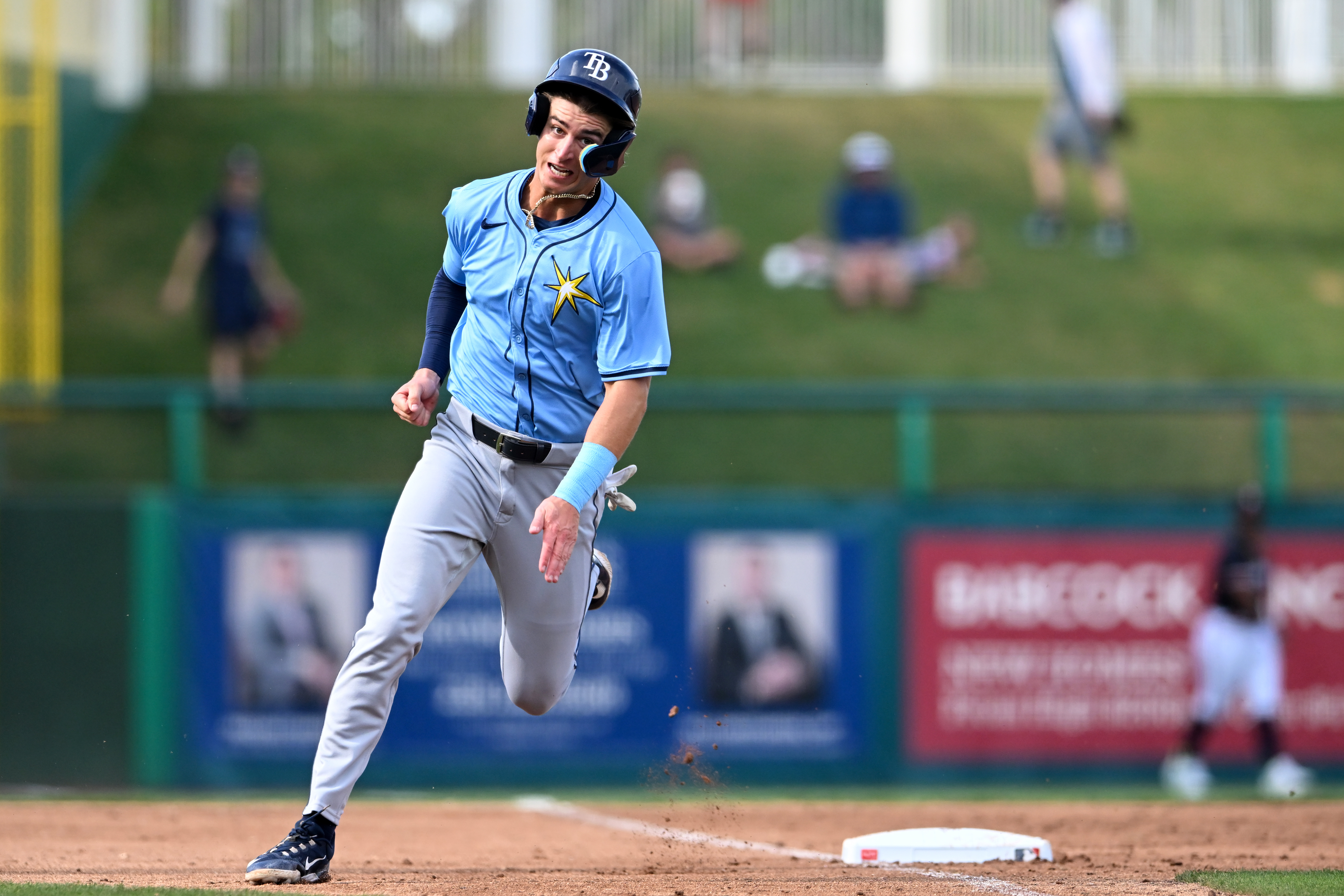Carson Williams #80 of the Tampa Bay Rays rounds third base to score during the third inning of a spring training Spring Breakout game against the Minnesota Twins at Hammond Stadium.
