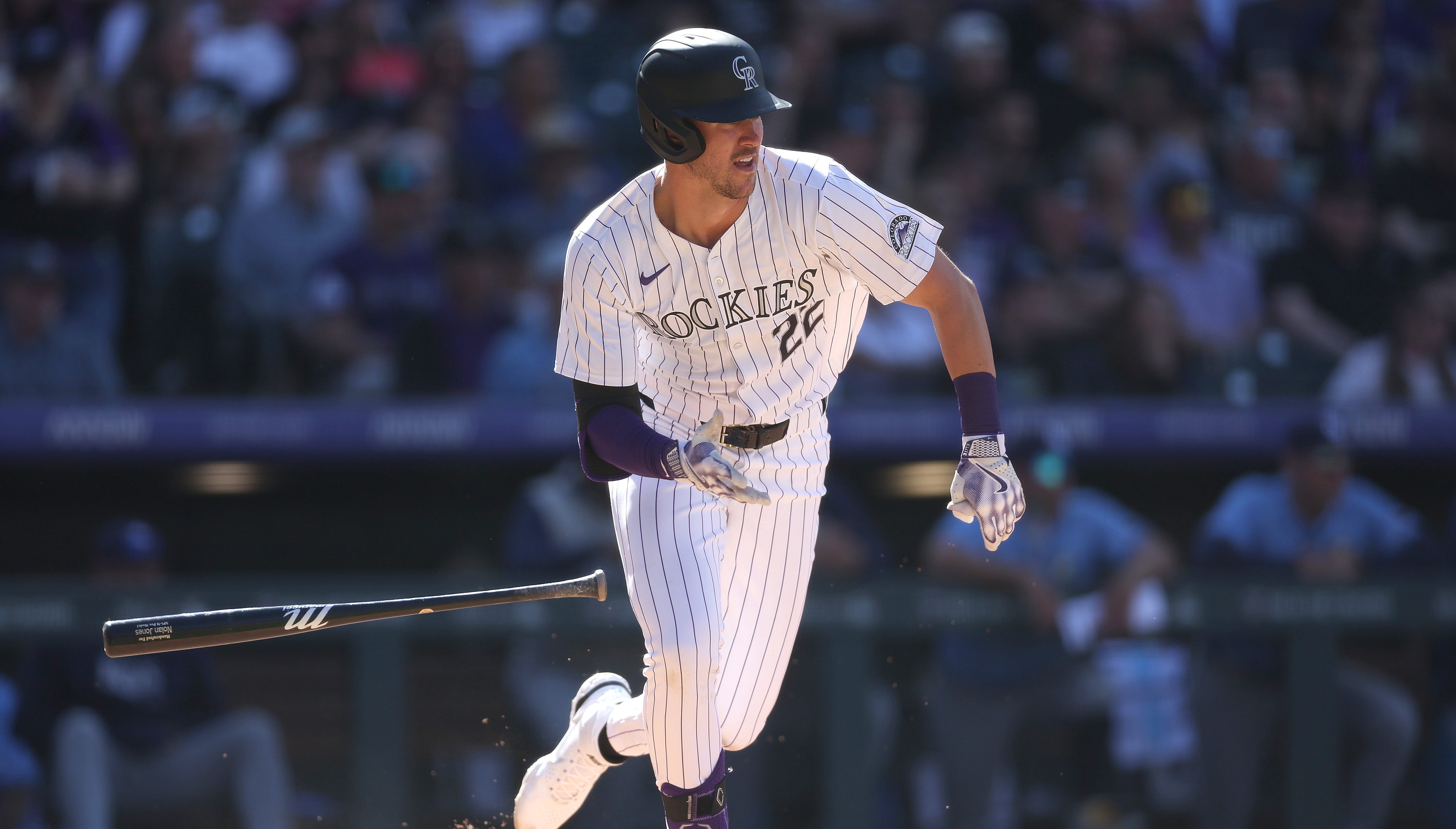 Nolan Jones of the Colorado Rockies hits a single against the Tampa Bay Rays.