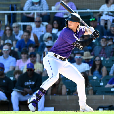 Zac Veen of the Colorado Rockies bats during the seventh inning of a spring training game against the Cincinnati Reds at Salt River Fields at Talking Stick.
