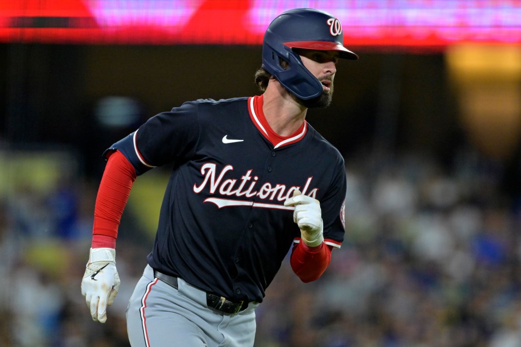 Jesse Winker of the Washington Nationals rounds the bases on a two-run home run in the third inning against the Los Angeles Dodgers at Dodger Stadium.