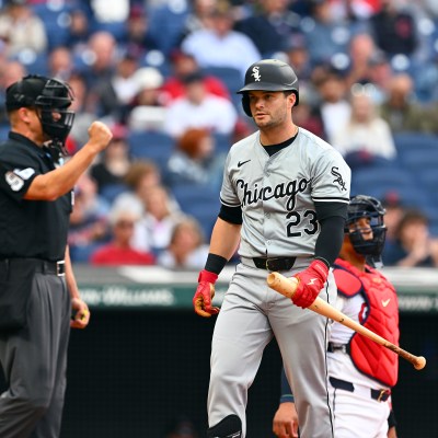 Andrew Benintendi of the Chicago White Sox walks away after striking out during the third inning against the Cleveland Guardians at Progressive Field.