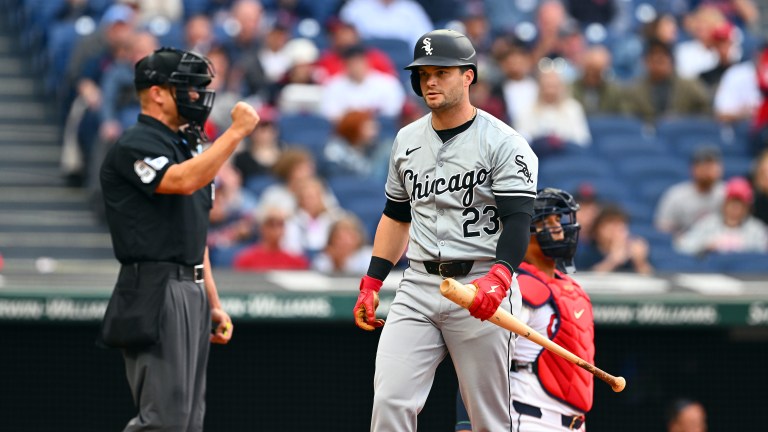 Andrew Benintendi of the Chicago White Sox walks away after striking out during the third inning against the Cleveland Guardians at Progressive Field.