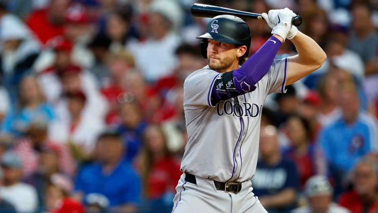 Ryan McMahon of the Colorado Rockies in action against the Philadelphia Phillies at Citizens Bank Park on April 15, 2024 in Philadelphia, Pennsylvania. All players are wearing the number 42 in honor of Jackie Robinson Day.