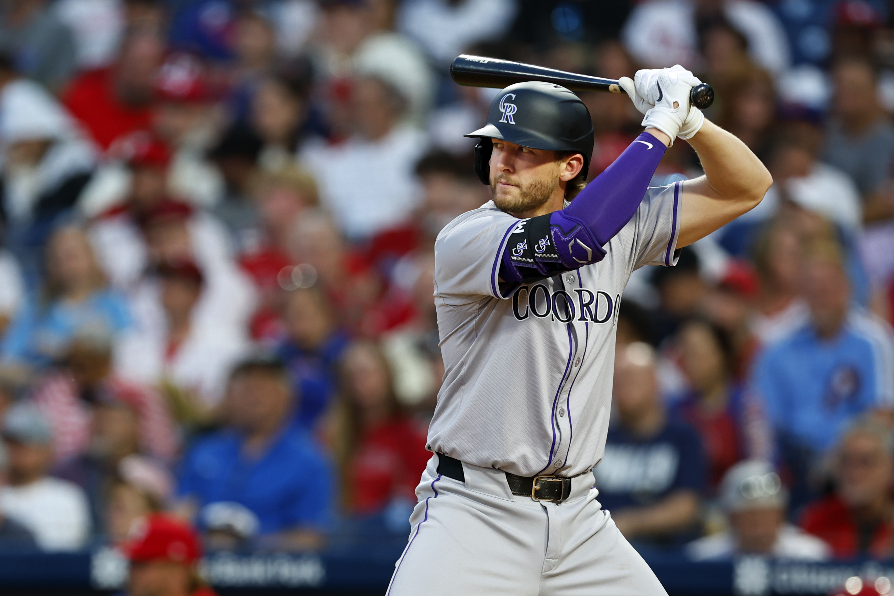Ryan McMahon of the Colorado Rockies in action against the Philadelphia Phillies at Citizens Bank Park on April 15, 2024 in Philadelphia, Pennsylvania. All players are wearing the number 42 in honor of Jackie Robinson Day.