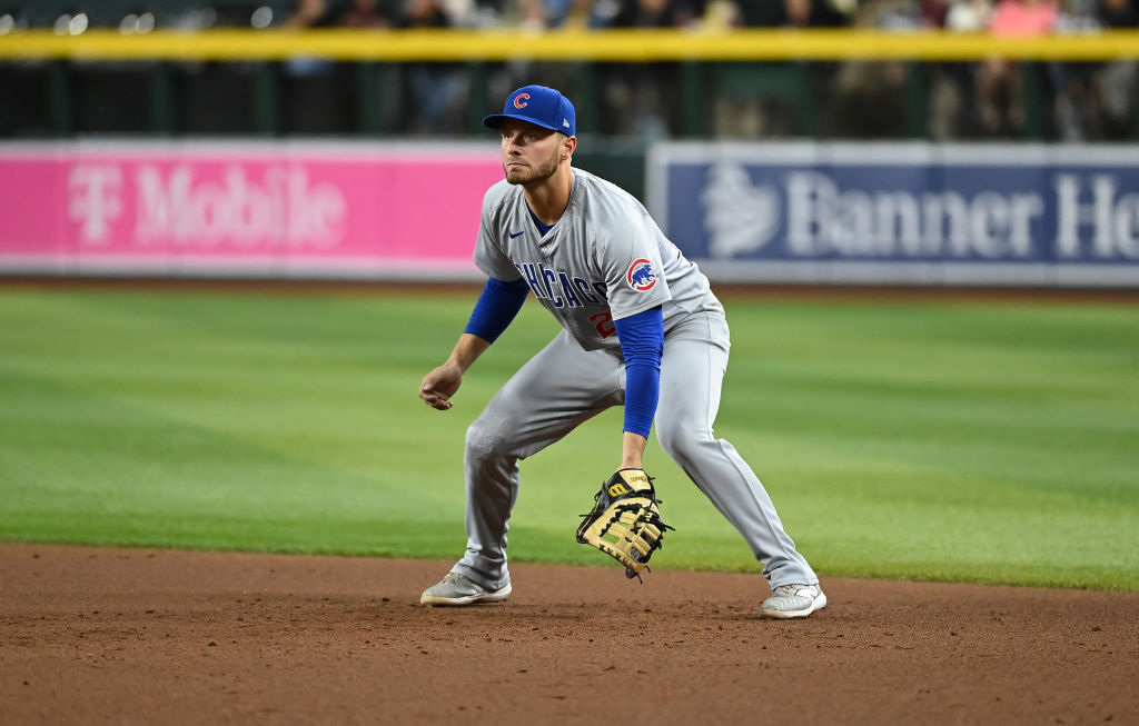 PHOENIX, ARIZONA - APRIL 16: Michael Busch #29 of the Chicago Cubs gets ready to make a play against the Arizona Diamondbacks at Chase Field on April 16, 2024 in Phoenix, Arizona. (Photo by Norm Hall/Getty Images)