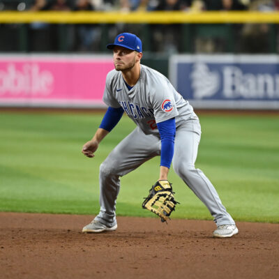 PHOENIX, ARIZONA - APRIL 16: Michael Busch #29 of the Chicago Cubs gets ready to make a play against the Arizona Diamondbacks at Chase Field on April 16, 2024 in Phoenix, Arizona. (Photo by Norm Hall/Getty Images)
