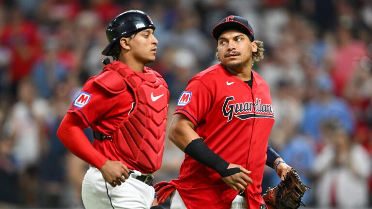 Josh Naylor and Bo Naylor of the Cleveland Guardians celebrate the team's 1-0 win over the Philadelphia Phillies at Progressive Field.
